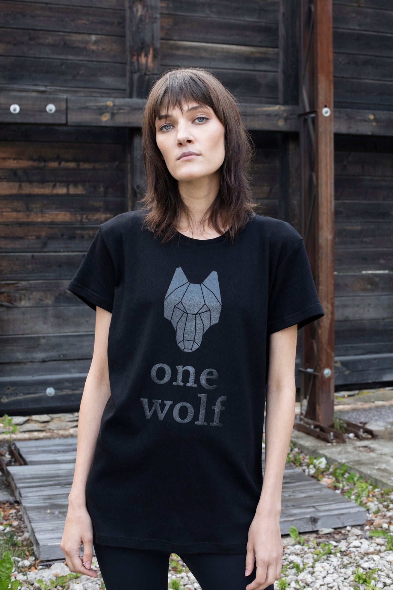 one wolf unisex black t-shirt front view