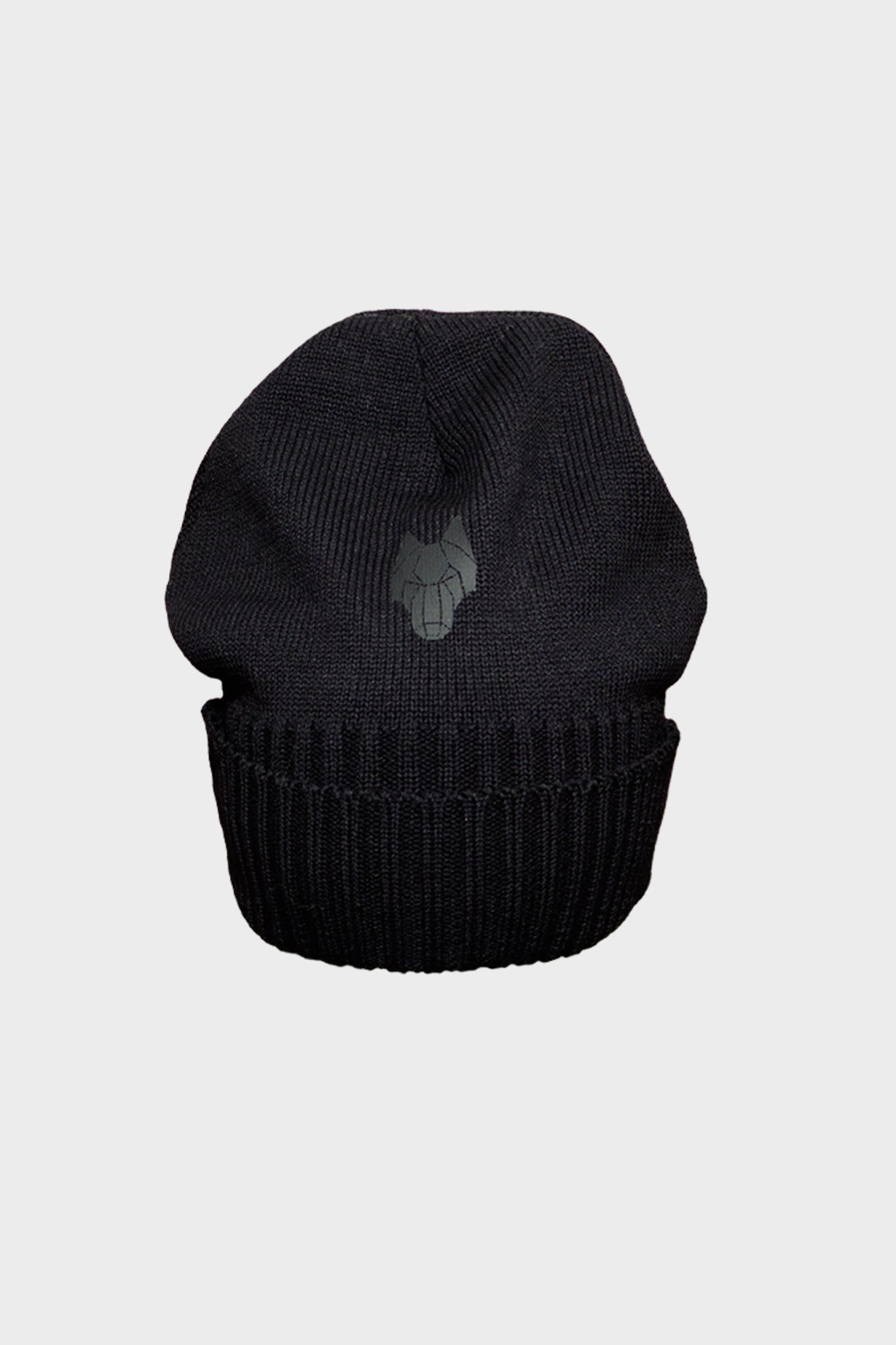 Close-up of One Wolf logo on 100% wool beanie