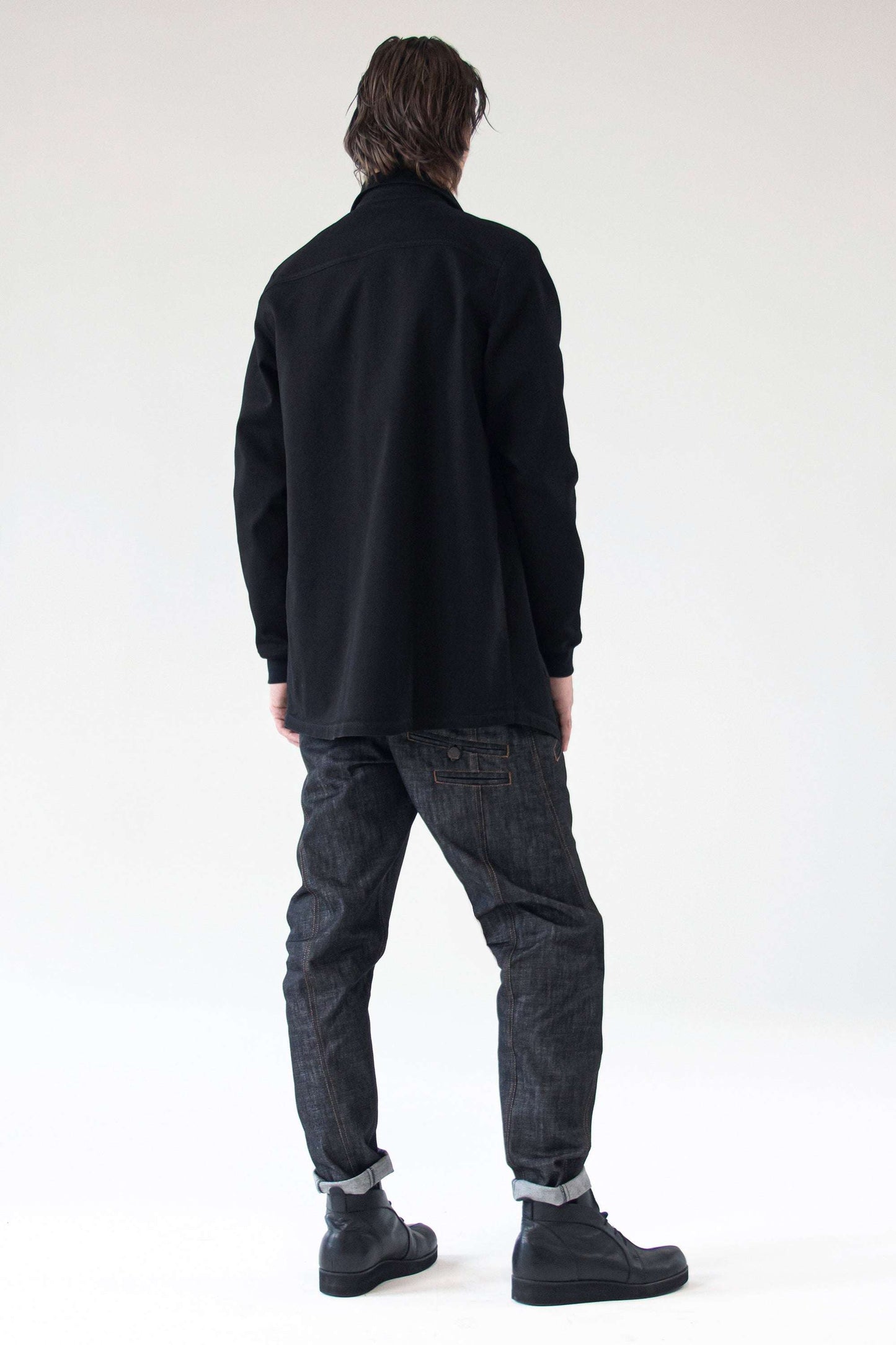 Back view of the One Wolf Unisex Denim Jacket Shirt DESIRE showing elongated silhouette.